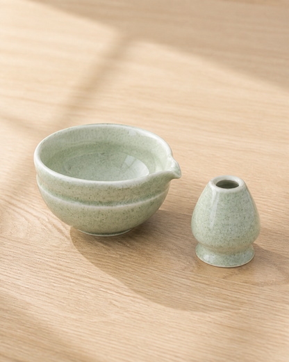 Bamboo Whisper matcha bowl and whisk holder on a wooden table