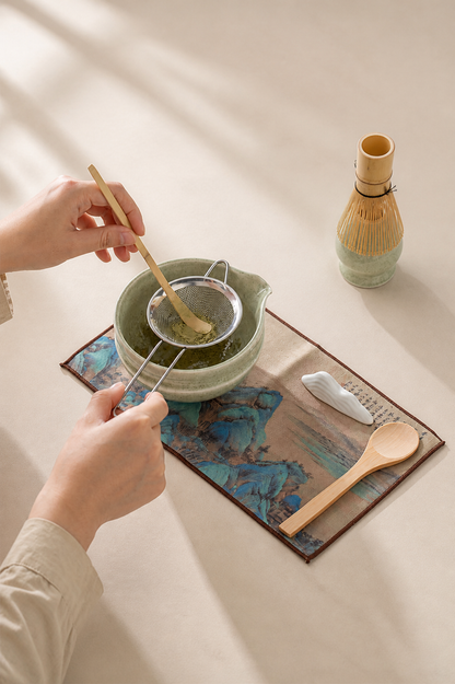 Straining matcha through the sifter into the Bamboo Whisper bowl