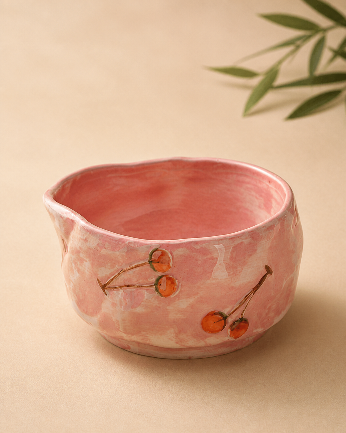 Cherry Willow matcha set close-up showing hand-painted ceramic bowl and bamboo whisk