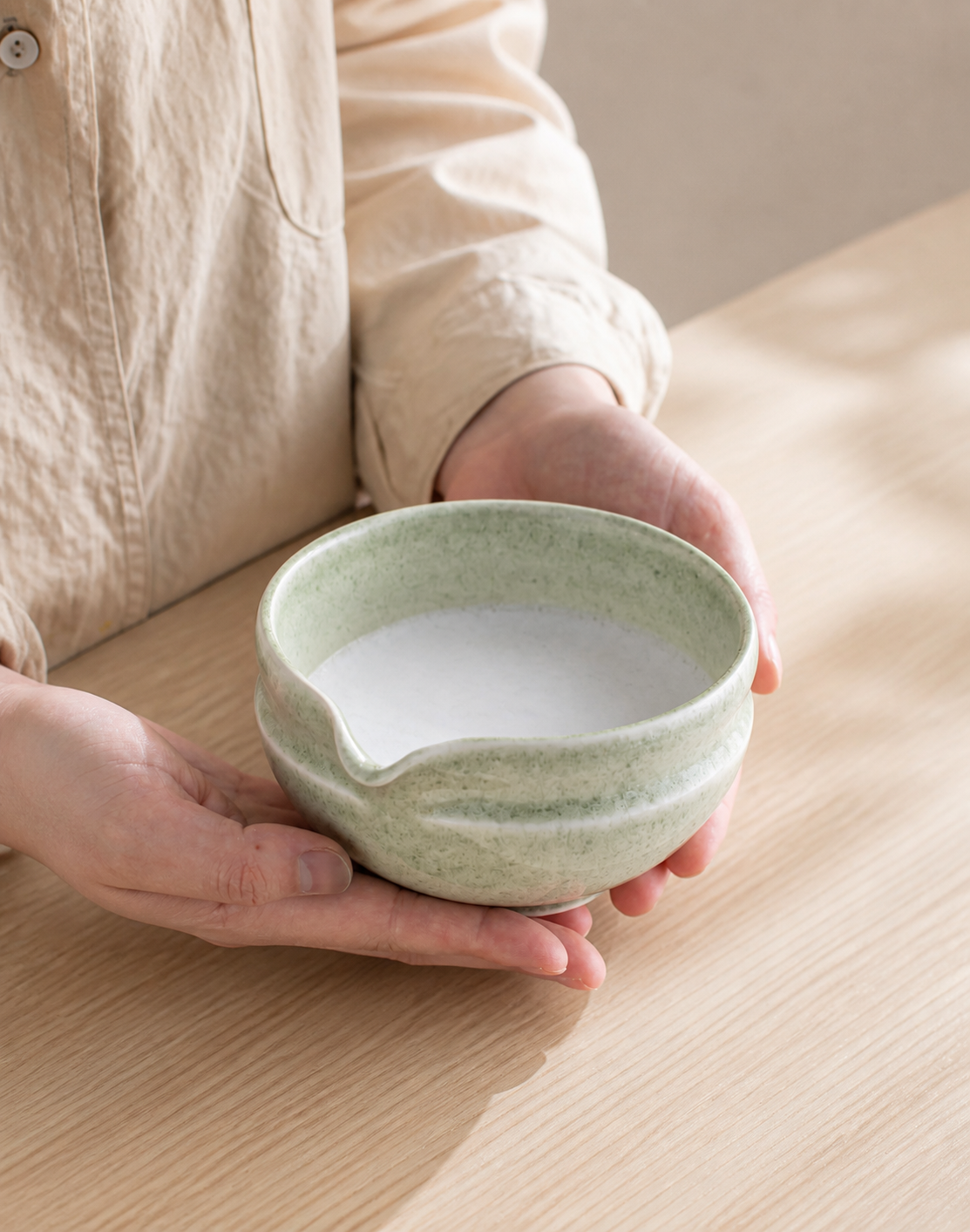 Holding the Bamboo Whisper ceramic matcha bowl