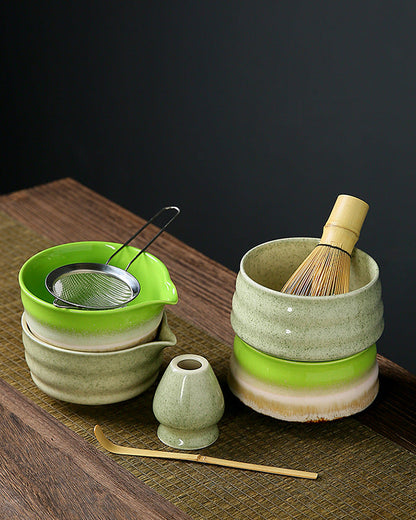 Ceramic matcha bowls, whisk holder, whisk, sifter, and scoop stacked