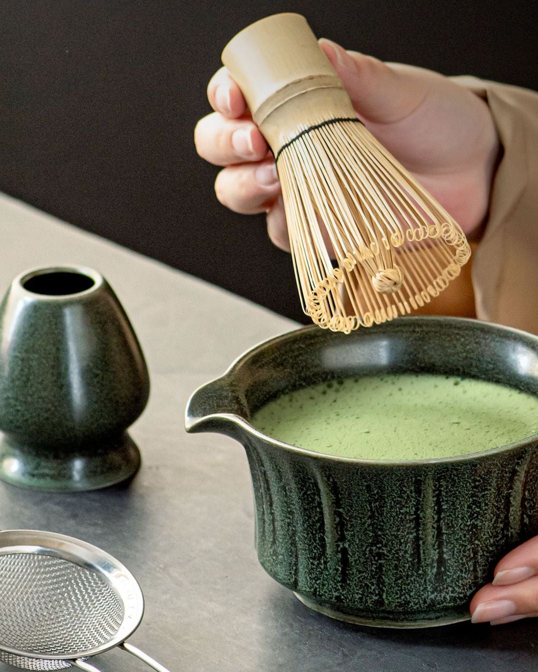 Matcha Spring ceramic bowl and tea tools arranged for an at-home matcha ceremony