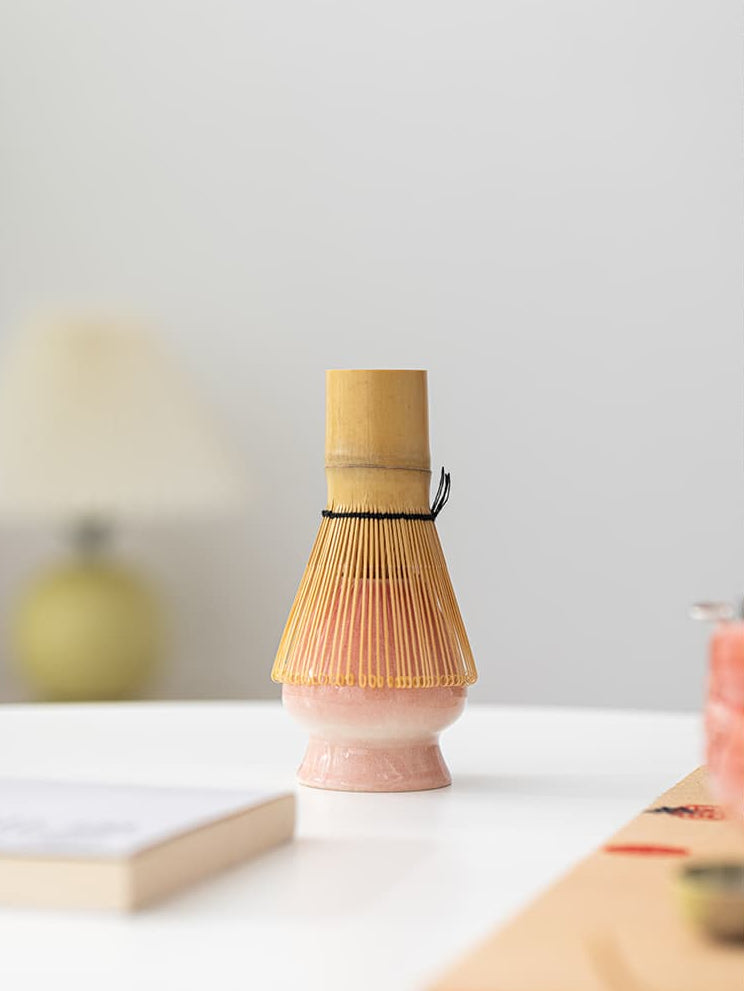 Blush Bow matcha gift set detail with ceramic pieces and bamboo whisk
