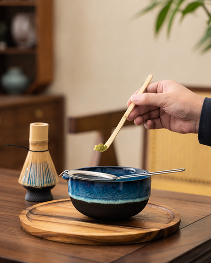 Kiln & Ritual blue matcha bowl and bamboo tools close-up
