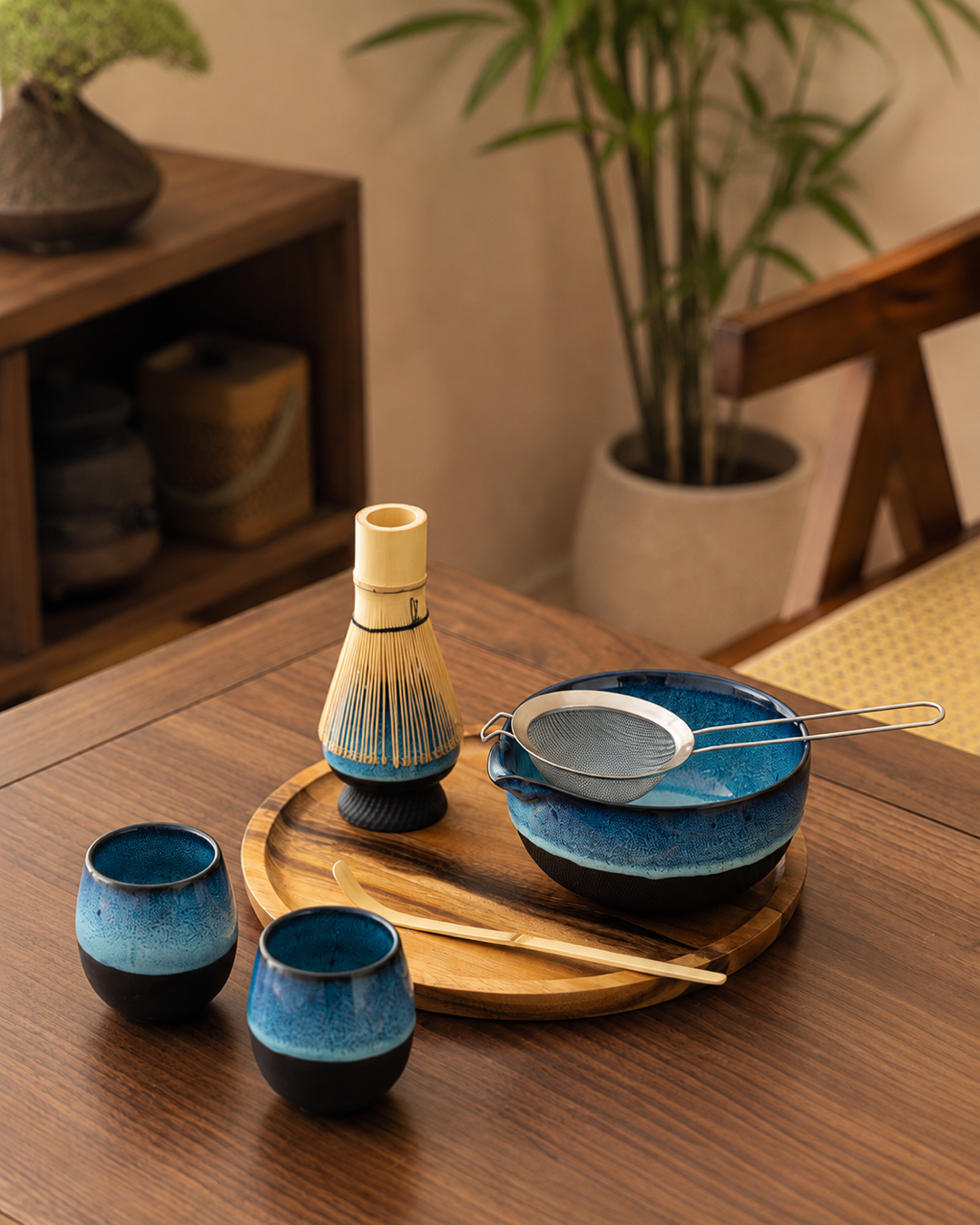Kiln & Ritual matcha set serving moment with blue ceramic cups
