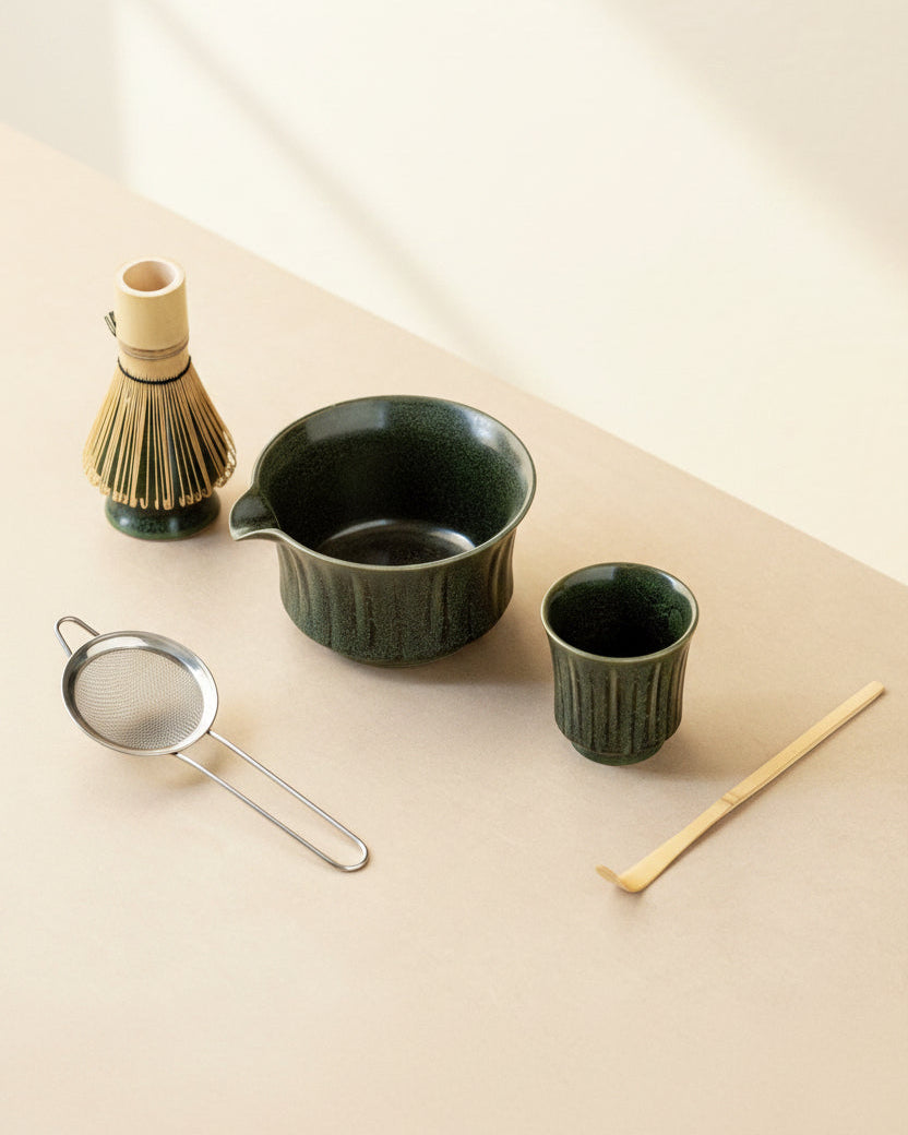 Bamboo Ritual 6-piece matcha set in dark green glaze, full flat lay