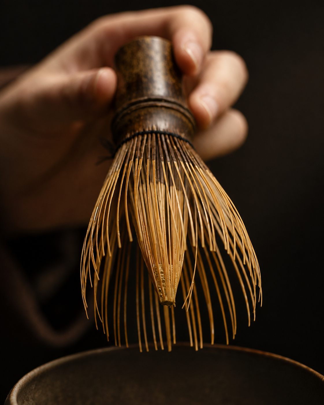 Purple bamboo chasen whisk for matcha preparation